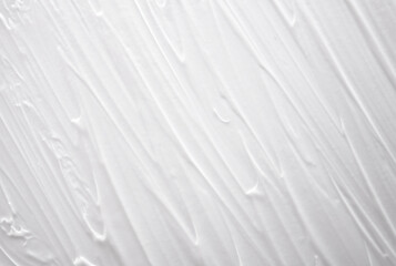 Face or body white cream or balm texture smudge background
