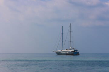 Fototapeta premium Maafushi, Maldives - June 25, 2021: Private Boat in the Indian Ocean with the Alcohol Drinks trading near Maafushi Island