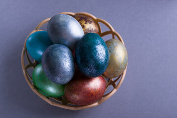 Red Easter eggs on a bright background. Easter background with eggs close up. Place for text.