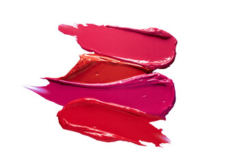 Lipstick fuxia purple terra cota red multicolored smudged on white isolated background