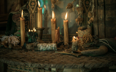 Candle burns on the altar, powerful magic among candles, pagan or wicca concept