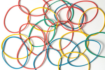 Abstract background. Colored rubber bands for money against white background