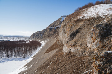 Fototapeta na wymiar Uklykaya Rock Bashkortostan Southern Urals, the nature of Russia mountains, winter on the Zilim River. Mountain landscape.