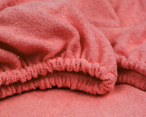 macro photo with texture of terry cotton fabric. Fabric with sewn-in elastic. A piece of clothing...