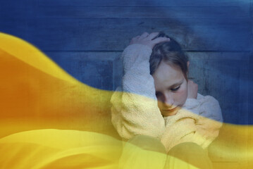Double exposure of little girl refugee r and Ukrainian flag.