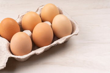 Organic chicken eggs on the table. Eggs are good for everyone and health. Farm products, natural eggs.