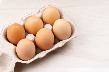 Organic chicken eggs on the table. Eggs are good for everyone and health. Farm products, natural eggs.