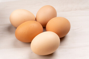Organic chicken eggs on the table. Eggs are good for everyone and health. Farm products, natural eggs.