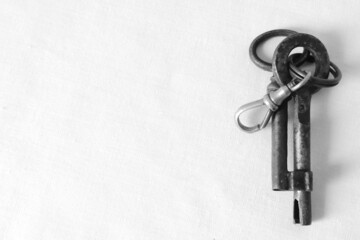 Rusty iron keys and keychain
