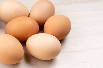 Organic chicken eggs on the table. Eggs are good for everyone and health. Farm products, natural eggs.