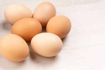 Organic chicken eggs on the table. Eggs are good for everyone and health. Farm products, natural eggs.