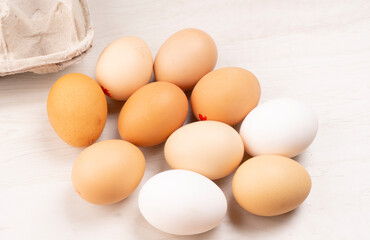 Organic chicken eggs on the table. Eggs are good for everyone and health. Farm products, natural eggs.