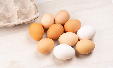 Organic chicken eggs on the table. Eggs are good for everyone and health. Farm products, natural eggs.
