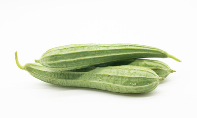 Fresh Angled luffa over on white background