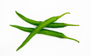 whole green chili pepper isolated on white background
