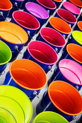 metal cans with multicolored paint. Background
