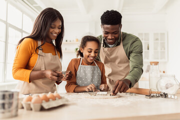 Black Family Making Cookies Using Baking Forms Cooking In Kitchen
