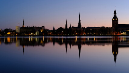 Fototapeta na wymiar Dawn over the Daugava in spring with Old Riga as a backdrop