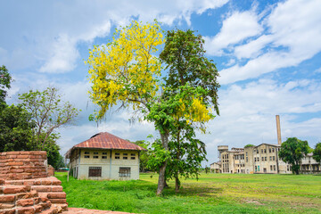Obraz premium The old paper mill used to produce paper and banknotes during World War II, transformed into a new public attraction in Kanchanaburi, Thailand. (Cultural Economics with Tourism). Historical buildings.