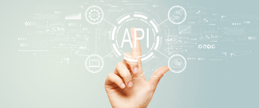 API - application programming interface concept with hand pressing a button on a technology screen