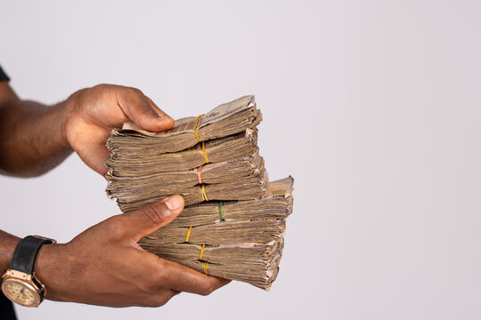 African Man Holding A Lot Of Money