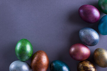 Red Easter eggs on a bright background. Easter background with eggs close up. Place for text.