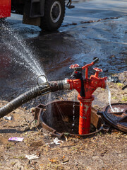 Fire hydrant. Firefighters on the streets of Kyiv