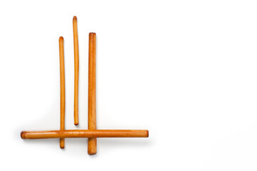 Four bamboo sticks to massage the face and other parts of the body.