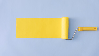 Yellow painted banner with paint roller and copyspace
