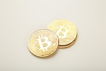 Bitcoin coin and on grey background. Bitcoin growthand investment concept.