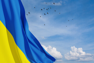 Ukraine flag on the blue sky with bird. Close up waving flag of Ukraine with place for your text. Flag symbols of Ukraine. 3d rendering.