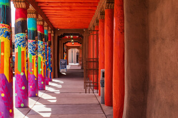 Fototapeta premium colorfully painted columns on the plaza in Santa Fe, New Mexico 