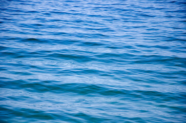 Fototapeta premium Abstract sea background smooth waves of blue water