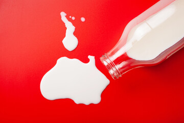 bad milk lactose intolerance allergy. milk bottle splatter. avoid dangerous dairy