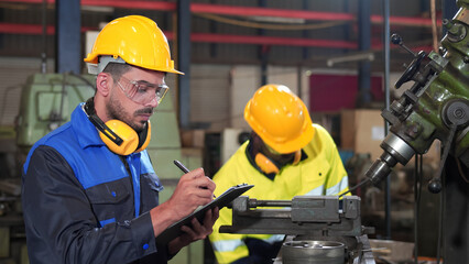 Diversity, colleague of industry heavy team engineer. Professional inspection, technician, worker wearing safety uniform, helmet, hardhat while checking maintenance machine line production factory.