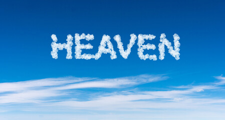 Fototapeta premium Heaven word made of clouds on blue sky background