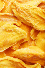 Dried sweet mango fruit slices as textural orange
