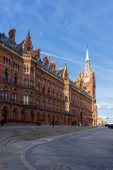 St Pancras Station, London.  A red-brick old building.