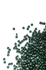Green tablets made of natural organic spirulina