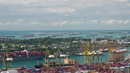 Time lapse of the bustling Singapore port in bright sunshine