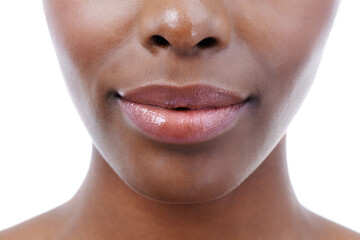Soft lips that everyone wants to kiss. Cropped closeup shot of an african american models mouth.
