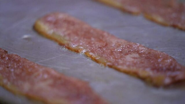 Cooking bacon in the restaurant