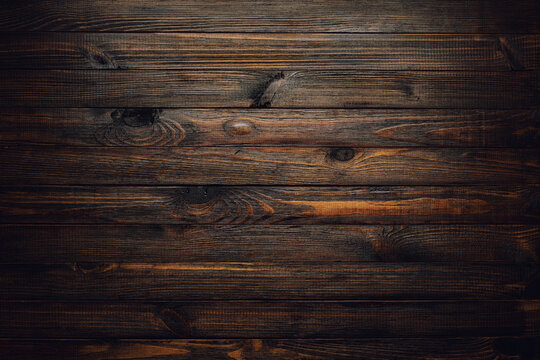 Dark stained rustic wood texture background