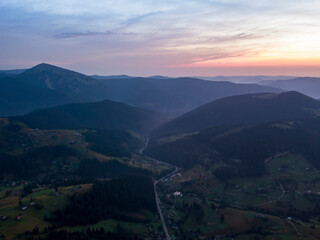 Fototapeta premium Ukrainian Carpathians mountains on a summer morning. Aerial drone view.