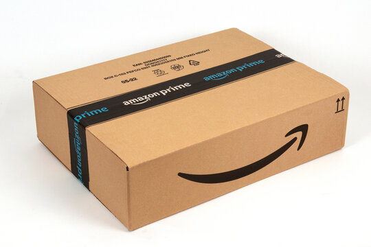 USA, year 2022, typical Amazon Prime cardboard box for online commerce on the white background