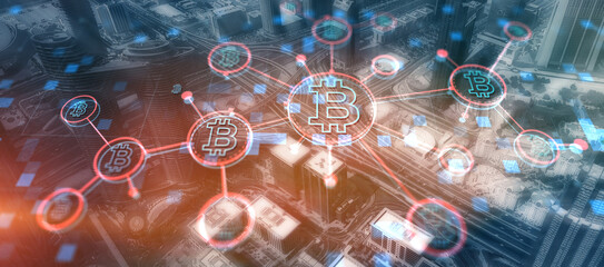 Bitcoin on corporate skyscrapers and office blocks background. Cryptocurrency future Technology