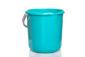 empty plastic bucket in turquoise color on a white isolated background