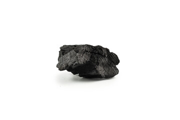 Black oak coal isolated on white background.