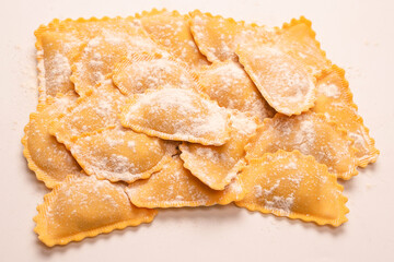 Fototapeta na wymiar Raw ravioli as background. Healthy italian food.