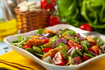 Delicious salad with broad beans and chicken.